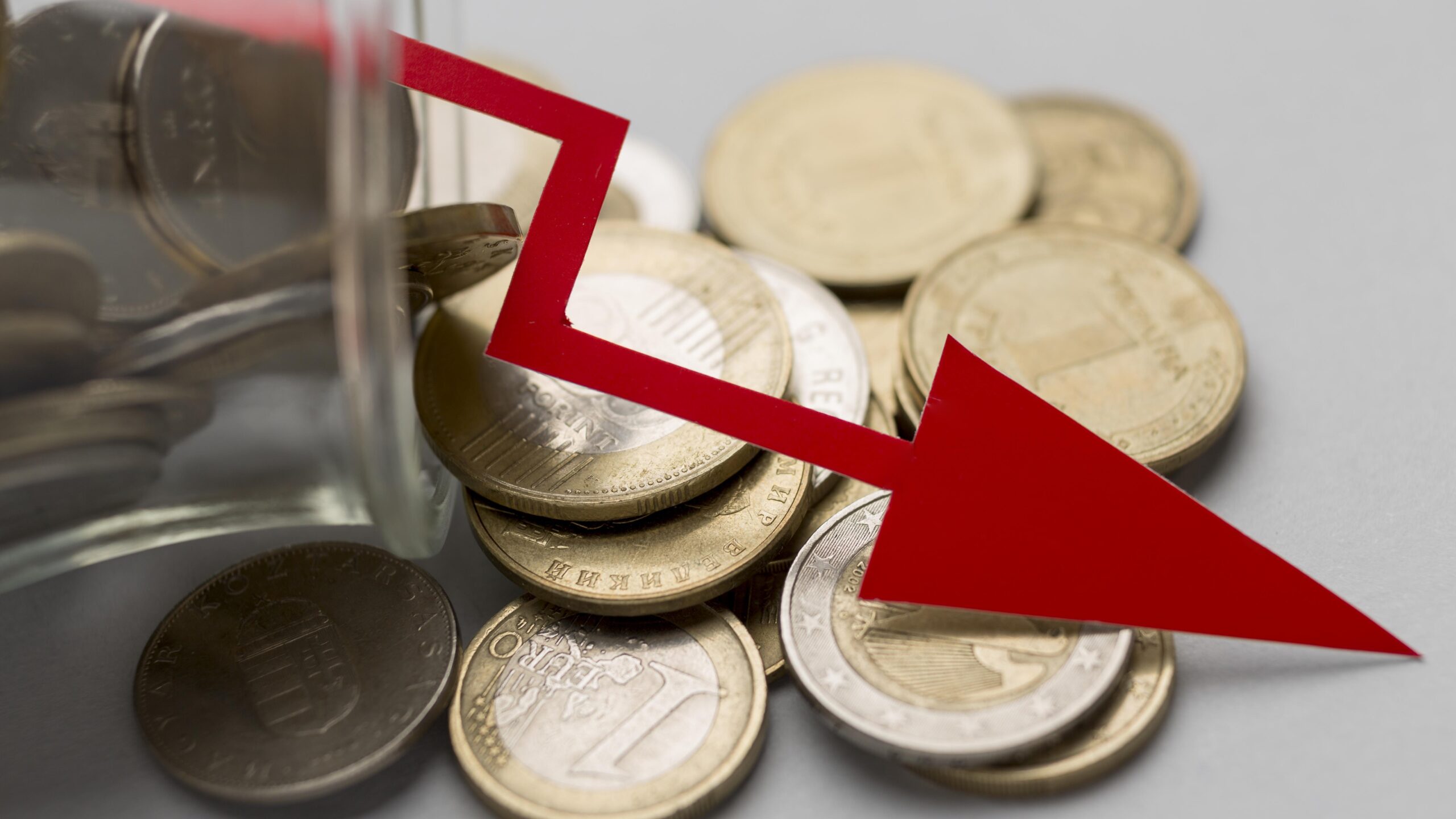 jar coins economy crisis concept scaled