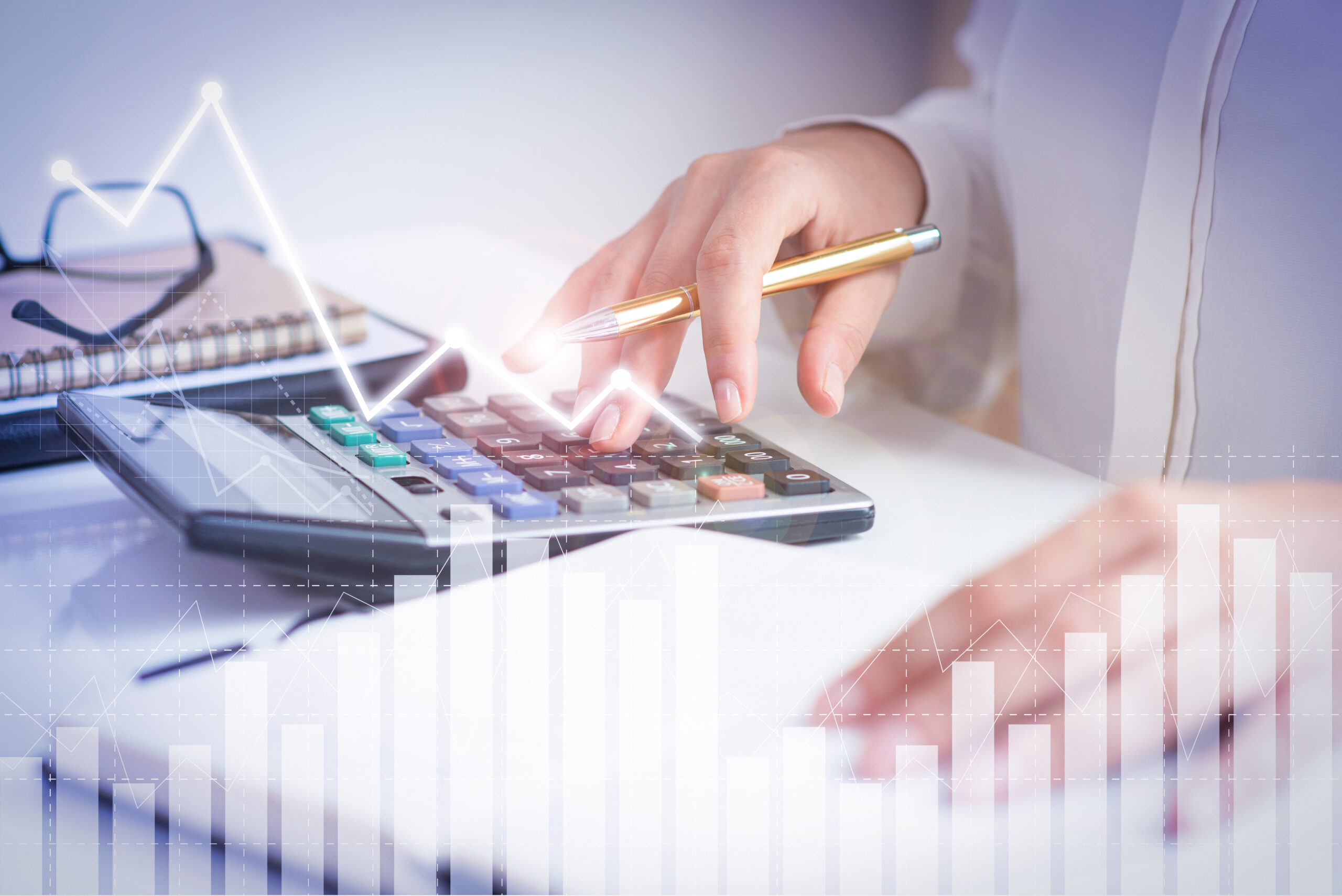 accountant calculating profit with financial analysis graphs scaled