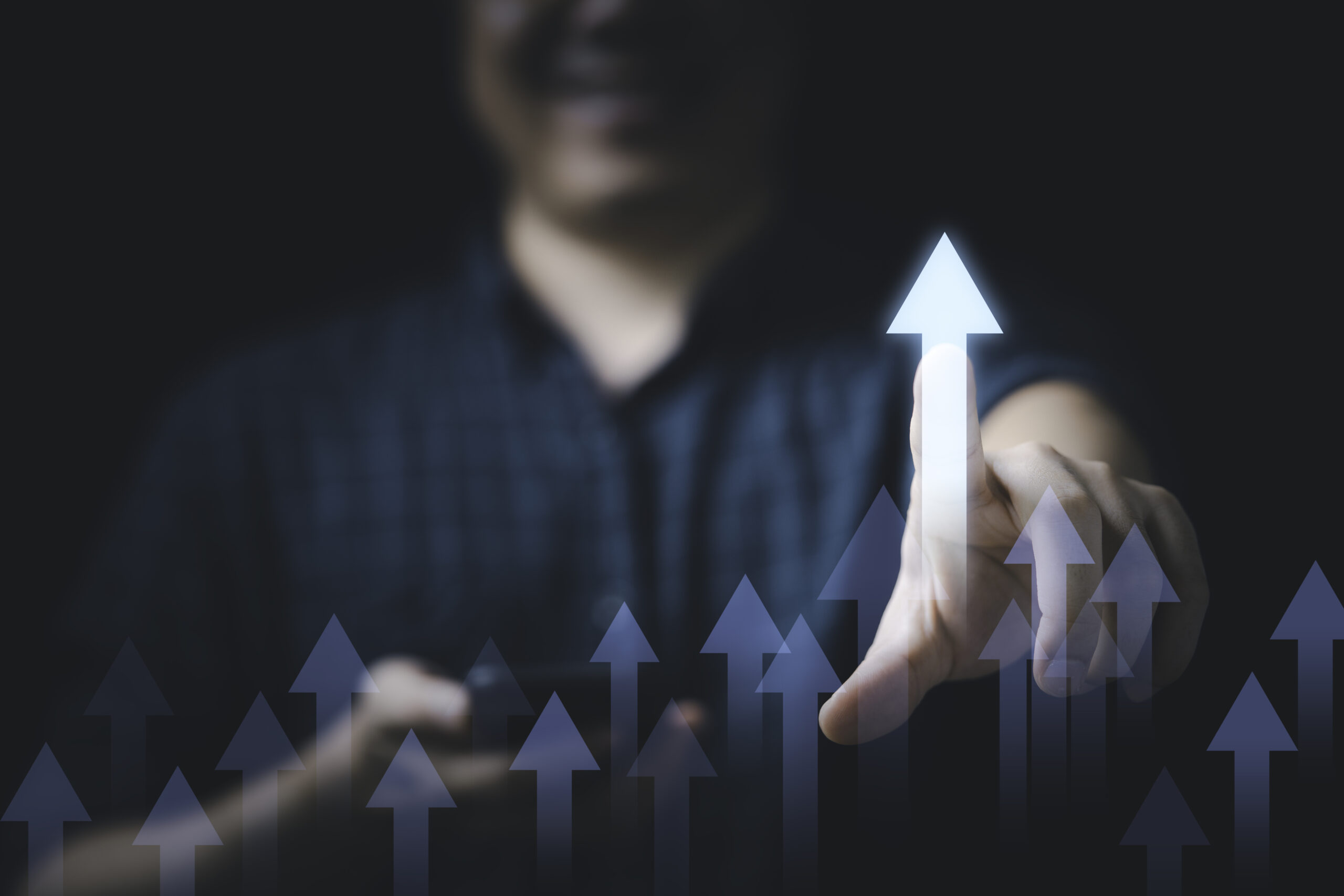 businessman touching glowing increasing arrow business profit investment growth concept scaled